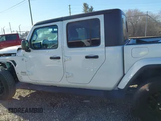 2023 Jeep Gladiator High Altitude with VIN 1C6HJTFG4PL560982, listed as a IAAI auction lot 41236477 with 28,835 mi miles and . Bid and sale history available at DreamBid. Image 14.