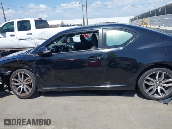 2014 Scion tC with VIN JTKJF5C71E3072199, listed as a IAAI auction lot 41956178 with 154,730 mi miles. Bid and sale history available at carsss.com. Image 14.