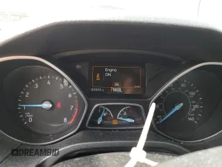 2015 Ford Focus SE z VIN 1FADP3F29FL312757, wystawiony jako Copart lot #61198315 z przebiegiem 84 944 mil mil oraz Szkoda całkowita • Salvage title. Historia ofert i sprzedaży dostępna na DreamBid. Obrazek 9.