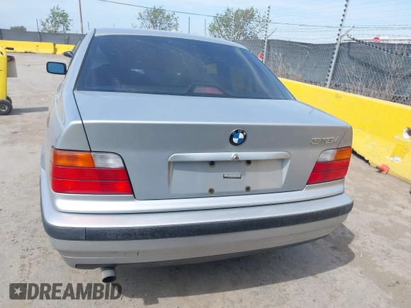 1997 BMW 3 Series 318iA with VIN WBACC0322VEK25478, listed as a IAAI auction lot 42033040 with 212,320 mi miles. Bid and sale history available at carsss.com. Image 16.