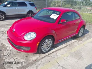 2013 Volkswagen Beetle 2.5L w/Sun/Sound/Nav with VIN 3VWJX7AT4DM672158, listed as a IAAI auction lot 42187543 with 94,961 mi miles and . Bid and sale history available at DreamBid. Image 2.