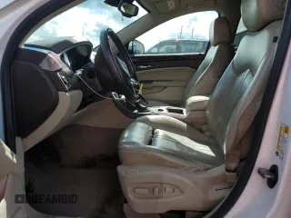 2014 Cadillac SRX Premium Collection z VIN 3GYFNGE31ES615593, wystawiony jako Copart lot #56785775 z przebiegiem 247 230 mil mil oraz Tytuł czysty. Historia ofert i sprzedaży dostępna na DreamBid. Obrazek 7.