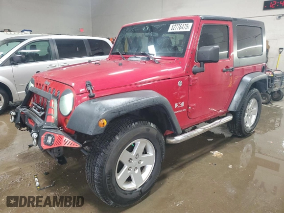 2008 Jeep Wrangler X with VIN 1J4FA24118L501599, listed as a Copart auction lot 52776475 with 74,186 mi miles and Salvage Title. Bid and sale history available at DreamBid. Image 1.