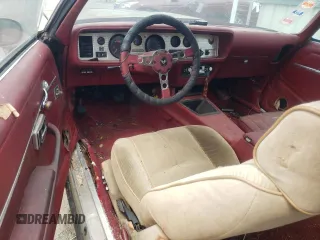 1979 Pontiac Firebird z VIN 2V8729L171075, wystawiony jako Copart lot #65532655 z przebiegiem 17 594 mil mil oraz Czysty tytuł • Clean title. Historia ofert i sprzedaży dostępna na DreamBid. Obrazek 8.