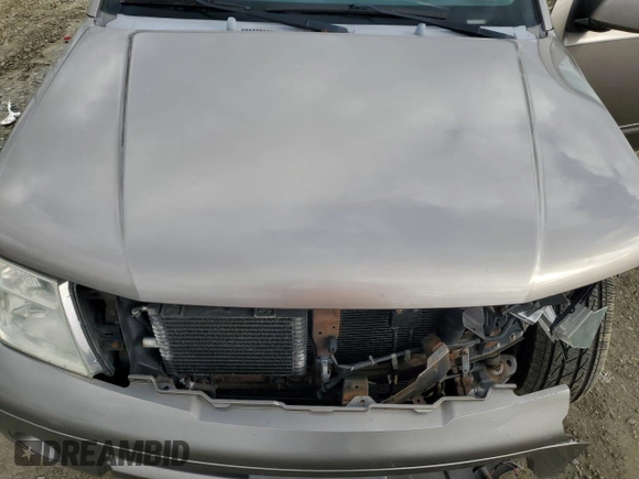 2006 Nissan Pathfinder SE z VIN 5N1AR18W96C664437, wystawiony jako Copart lot #53240165 z przebiegiem 168 019 mil mil oraz Szkoda całkowita • Salvage title. Historia ofert i sprzedaży dostępna na DreamBid. Obrazek 13.