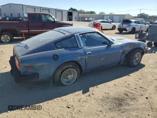 1979 Datsun 280ZX z VIN HS130133365, wystawiony jako Copart lot #77113584 z przebiegiem 99 721 mil mil oraz Szkody całkowita. Historia ofert i sprzedaży dostępna na DreamBid. Obrazek 3.