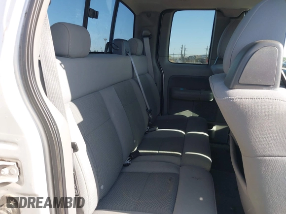 2004 Ford F-150 XL with VIN 1FTPX12594NA32477, listed as a IAAI auction lot 42088113 with 266,389 mi miles. Bid and sale history available at carsss.com. Image 8.