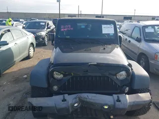 2017 Jeep Wrangler Unlimited Sport with VIN 1C4BJWDG0HL528695, listed as a IAAI auction lot 41229124 with 160,410 mi miles. Bid and sale history available at carsss.com. Image 12.