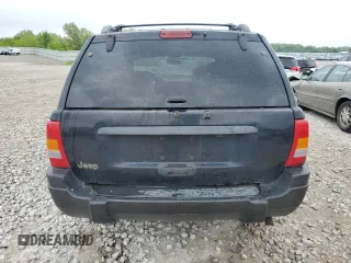 2000 Jeep Grand Cherokee Laredo z VIN 1J4GW48S1YC326453, wystawiony jako Copart lot #57332675 z przebiegiem 290 059 mil mil oraz Czysty tytuł • Clean title. Historia ofert i sprzedaży dostępna na DreamBid. Obrazek 6.