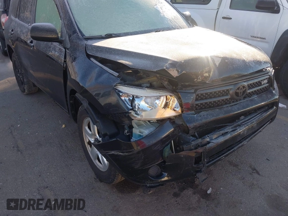 2008 Toyota RAV4 with VIN JTMBK33V986039352, listed as a IAAI auction lot 41824376 with 245,503 mi miles. Bid and sale history available at carsss.com. Image 6.