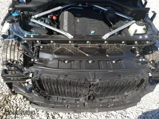 2024 BMW X5 sDrive40i with VIN 5UX13EU01R9S43357, listed as a Copart auction lot 46348935 with 11,451 mi miles and Salvage Title. Bid and sale history available at carsss.com. Image 12.