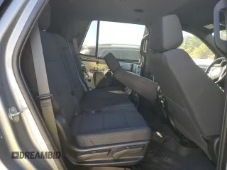 2023 Chevrolet Tahoe LS z VIN 1GNSCMKDXPR198087, wystawiony jako Copart lot #75393274 z przebiegiem 50 764 mil mil oraz Szkoda całkowita • Salvage title. Historia ofert i sprzedaży dostępna na DreamBid. Obrazek 11.