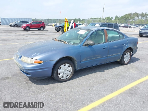 1999 Oldsmobile Alero GL z VIN 1G3NL52TXXC339892, wystawiony jako IAAI lot #41935539 z przebiegiem 315 555 mil mil oraz . Historia ofert i sprzedaży dostępna na DreamBid. Obrazek 2.