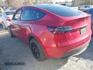 2023 Tesla Model Y Long Range with VIN 7SAYGDEE0PA202150, listed as a IAAI auction lot 41735258 with 22,131 mi miles and . Bid and sale history available at DreamBid. Image 3.