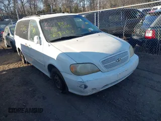 2005 Kia Sedona LX with VIN KNDUP132756764528, listed as a IAAI auction lot 41709414 with 999,999 mi miles. Bid and sale history available at carsss.com. Image 1.