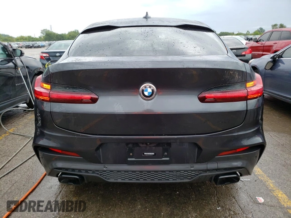 2021 BMW X4 M40i with VIN 5UX2V5C08M9E17162, listed as a Copart auction lot 67602073 with 33,879 mi miles. Bid and sale history available at carsss.com. Image 6.