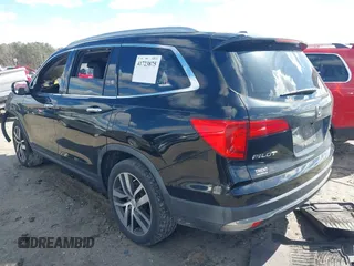 2016 Honda Pilot Elite with VIN 5FNYF6H0XGB127133, listed as a IAAI auction lot 41723875 with Not Provided miles. Bid and sale history available at carsss.com. Image 3.
