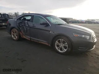 2015 Ford Taurus SEL with VIN 1FAHP2H81FG172404, listed as a Copart auction lot 85372414 with 146,894 mi miles and Salvage Title. Bid and sale history available at carsss.com. Image 4.