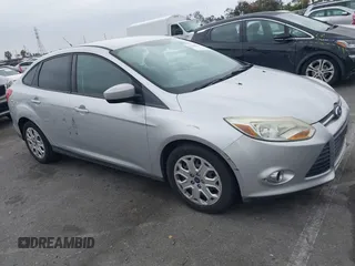2012 Ford Focus SE with VIN 1FAHP3F27CL257447, listed as a IAAI auction lot 42180626 with 130,155 mi miles. Bid and sale history available at carsss.com. Image 1.