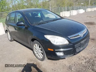 2009 Hyundai Elantra Touring z VIN KMHDC86E89U039396, wystawiony jako IAAI lot #42172072 z przebiegiem 181 470 mil mil oraz . Historia ofert i sprzedaży dostępna na DreamBid. Obrazek 1.