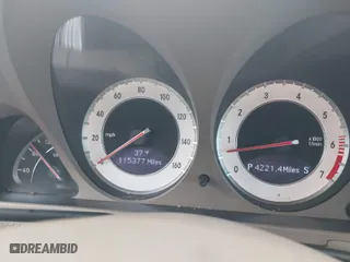 2009 Mercedes-Benz SL-Class V8 with VIN WDBSK71F29F143653, listed as a IAAI auction lot 41310556 with 115,377 mi miles. Bid and sale history available at carsss.com. Image 7.