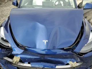 2024 Tesla Model Y Long Range с VIN 7SAYGDEE5RF983771, выставлен на аукционе Copart как лот 86153274 с пробегом 4 105 миль миль и Списание • Salvage title. История ставок и продаж доступна на DreamBid. Изображение 12.
