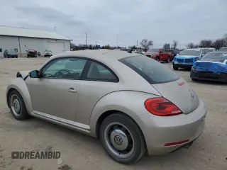 2012 Volkswagen Beetle 2.5L with VIN 3VWJX7AT0CM660829, listed as a Copart auction lot 87930105 with 71,240 mi miles and Salvage Title. Bid and sale history available at carsss.com. Image 2.