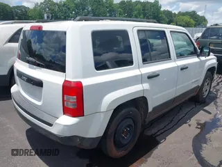 2013 Jeep Patriot Sport with VIN 1C4NJPBA1DD124830, listed as a IAAI auction lot 42505283 with 139,657 mi miles and . Bid and sale history available at DreamBid. Image 4.