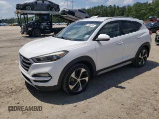 2017 Hyundai Tucson Value z VIN KM8J33A29HU374524, wystawiony jako Copart lot #56940965 z przebiegiem 123 997 mil mil oraz Szkoda całkowita • Salvage title. Historia ofert i sprzedaży dostępna na DreamBid. Obrazek 1.