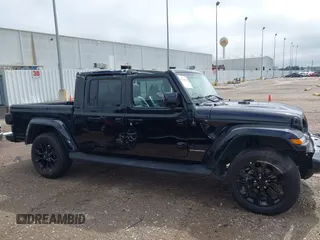 2023 Jeep Gladiator Overland with VIN 1C6HJTFG6PL555153, listed as a IAAI auction lot 42210878 with 40,576 mi miles and . Bid and sale history available at DreamBid. Image 14.