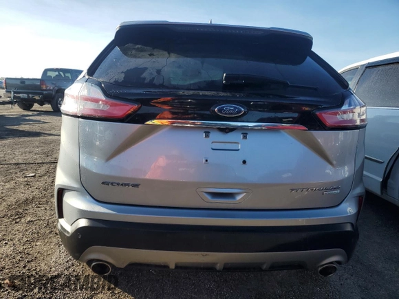 2020 Ford Edge Titanium с VIN 2FMPK3K98LBA15799, выставлен на аукционе Copart как лот 46196085 с пробегом Не указан миль и На запчасти • Non repairable. История ставок и продаж доступна на DreamBid. Изображение 6.