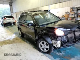 2005 Hyundai Tucson GL with VIN KM8JM12BX5U205060, listed as a Copart auction lot 71282644 with 243,076 mi miles and Salvage Title. Bid and sale history available at carsss.com. Image 12.