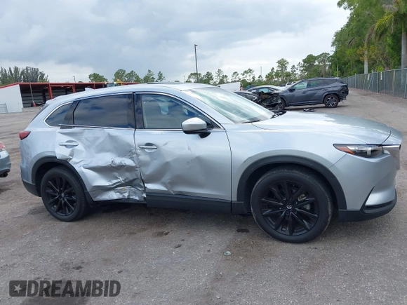 2023 Mazda CX-9 Touring Plus with VIN JM3TCBAY7P0652913, listed as a IAAI auction lot 42186917 with 20,649 mi miles and . Bid and sale history available at DreamBid. Image 6.