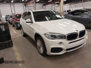 2015 BMW X5 xDrive50i z VIN 5UXKR6C50F0J76255, wystawiony jako IAAI lot #42104019 z przebiegiem 74 400 mil mil oraz . Historia ofert i sprzedaży dostępna na DreamBid. Obrazek 1.