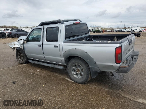 2002 Nissan Frontier SE with VIN 1N6ED27T92C379360, listed as a Copart auction lot 51235495 with 230,598 mi miles and Salvage title. Bid and sale history available at DreamBid. Image 2.