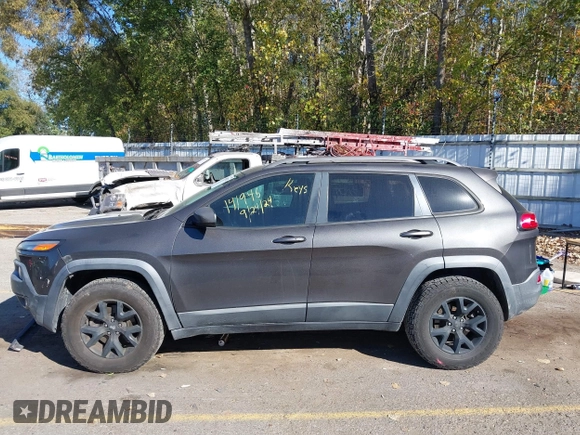 2014 Jeep Cherokee Trailhawk with VIN 1C4PJMBB0EW237741, listed as a IAAI auction lot 40505251 with 139,883 mi miles and . Bid and sale history available at DreamBid. Image 14.