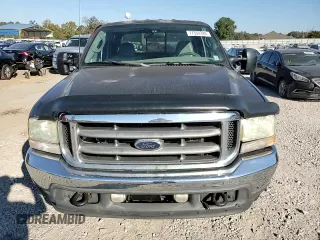 2003 Ford Super Duty F-250 XL with VIN 1FTNW20F73EB02536, listed as a Copart auction lot 77330394 with 170,102 mi miles and Salvage Title. Bid and sale history available at carsss.com. Image 10.