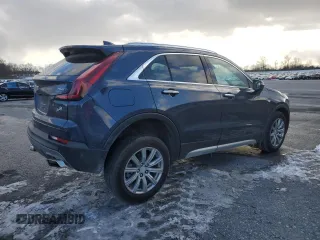 2021 Cadillac XT4 AWD Premium Luxury with VIN 1GYFZDR4XMF007080, listed as a Copart auction lot 87943335 with 36,379 mi miles and Salvage Title. Bid and sale history available at carsss.com. Image 3.