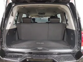 2015 Nissan Armada Platinum z VIN 5N1BA0NE9FN614577, wystawiony jako IAAI lot #41537644 z przebiegiem 89 109 mil mil oraz . Historia ofert i sprzedaży dostępna na DreamBid. Obrazek 17.