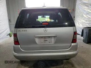 2000 Mercedes-Benz M 320/430/500 с VIN 4JGAB72E6YA200592, выставлен на аукционе Copart как лот 57261935 с пробегом 210 338 миль миль и Чистый • Clean title. История ставок и продаж доступна на DreamBid. Изображение 6.