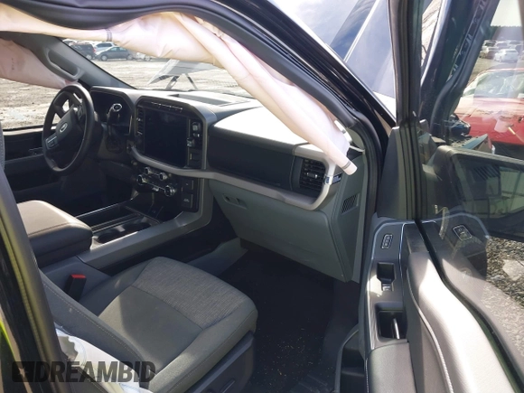 2023 Ford F-150 XL with VIN 1FTFW1E53PKG07088, listed as a IAAI auction lot 41442237 with 21,403 mi miles. Bid and sale history available at carsss.com. Image 5.