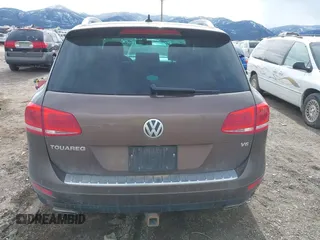 2013 Volkswagen Touareg Lux with VIN WVGEF9BP1DD012851, listed as a IAAI auction lot 41732391 with 123,283 mi miles and . Bid and sale history available at DreamBid. Image 17.