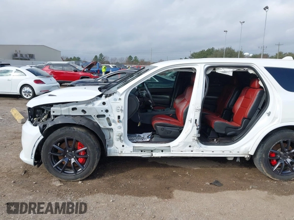 2018 Dodge Durango SRT with VIN 1C4SDJGJ4JC341550, listed as a IAAI auction lot 41525295 with 86,503 mi miles and . Bid and sale history available at DreamBid. Image 6.