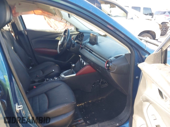 2018 Mazda CX-3 Touring z VIN JM1DKFC73J0301449, wystawiony jako IAAI lot #41678604 z przebiegiem 105 249 mil mil oraz . Historia ofert i sprzedaży dostępna na DreamBid. Obrazek 5.