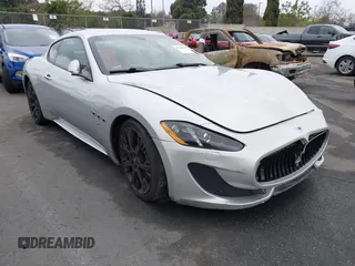 2013 Maserati GranTurismo Sport with VIN ZAM45VLA1D0072153, listed as a IAAI auction lot 41443836 with 44,991 mi miles. Bid and sale history available at carsss.com. Image 1.