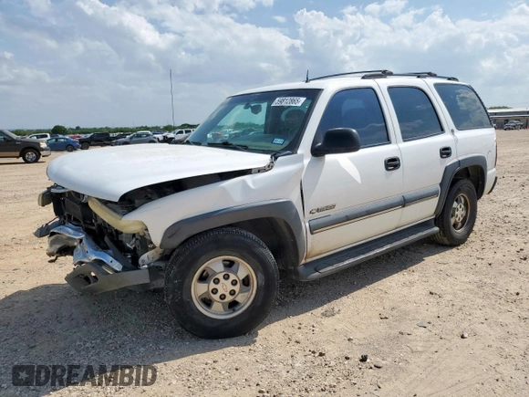 2002 Chevrolet Tahoe LS with VIN 1GNEC13Z32R200857, listed as a Copart auction lot 59812865 with 116,823 mi miles and Salvage title. Bid and sale history available at DreamBid. Image 1.