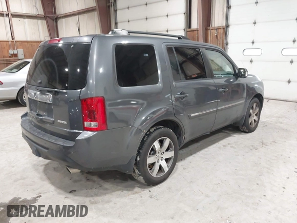 2012 Honda Pilot Touring with VIN 5FNYF4H99CB052034, listed as a IAAI auction lot 42023430 with 137,428 mi miles. Bid and sale history available at carsss.com. Image 4.