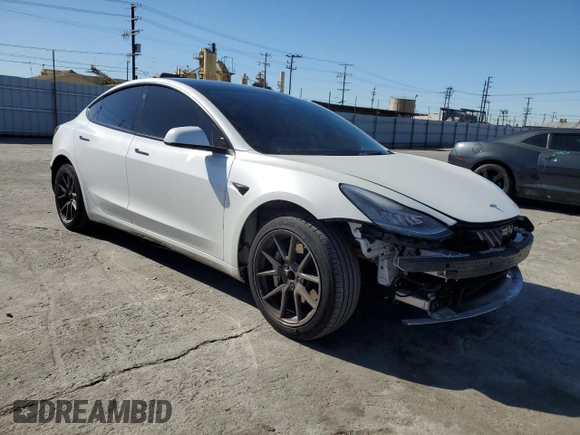 2022 Tesla Model 3 with VIN 5YJ3E1EA3NF125895, listed as a Copart auction lot 50042005 with 47,181 mi miles and Salvage Title. Bid and sale history available at DreamBid. Image 4.