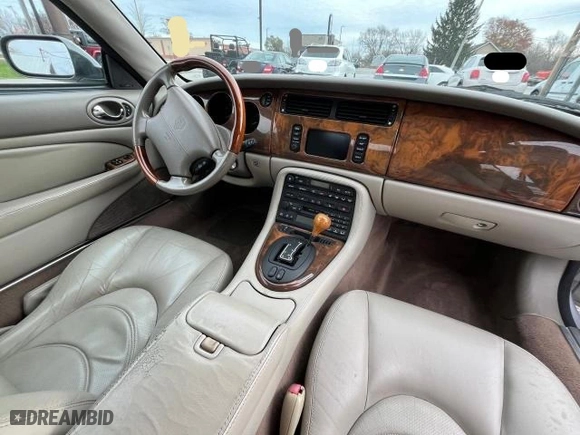 2001 Jaguar XK8 with VIN SAJDA42B71PA15810, listed as a Copart auction lot 83520864 with 103,531 mi miles and Clean Title. Bid and sale history available at carsss.com. Image 9.