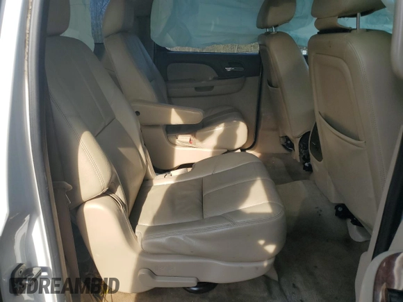 2013 Chevrolet Suburban LT with VIN 1GNSKJE74DR239851, listed as a Copart auction lot 44856425 with 203,074 mi miles and Salvage Title. Bid and sale history available at DreamBid. Image 11.
